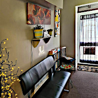 Entrance and seating area inside The Maltings Clinic